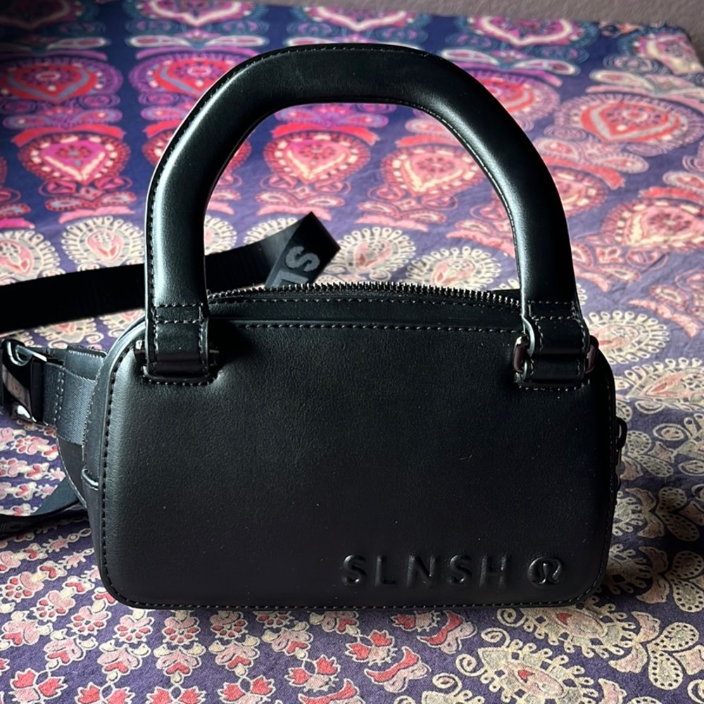 Black Mini Bag with Matte Finish and Curved Handle